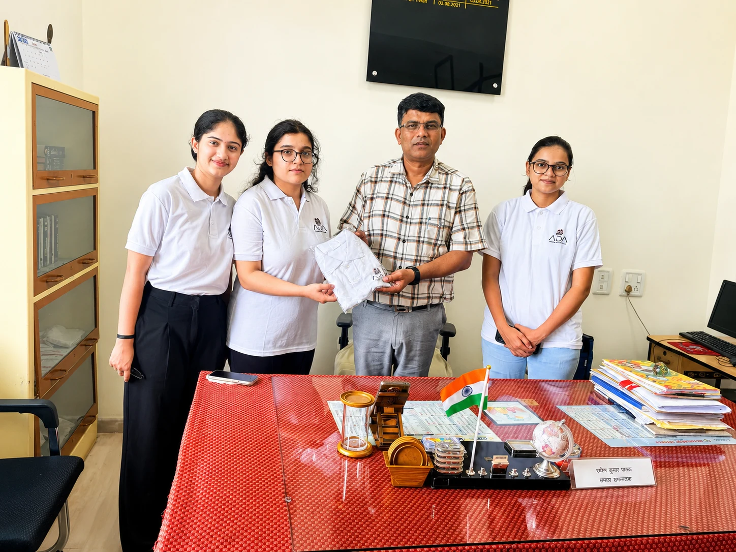 ADA volunteers with a community partner
